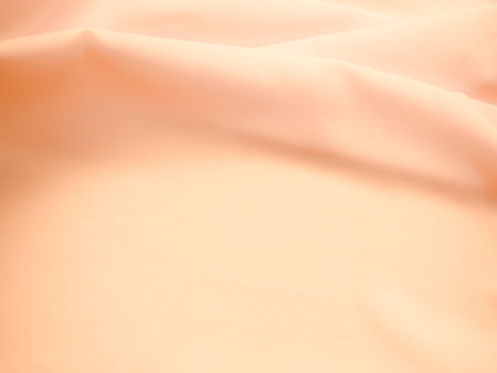 close up of pink silk fabric texture for background and copy space.の写真素材
