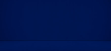 Blue gradient background. Smooth Dark blue with Black vignette Studio well use as background.の写真素材