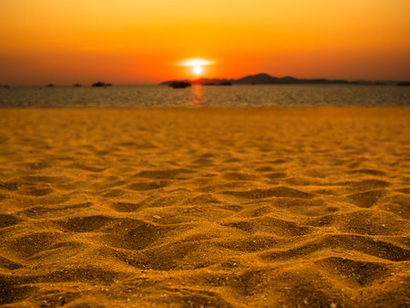 Beach Sunset Sea Summer Landscape Background,Golden Sunrise Horizon Nature Light on Calm Ocean,Paradise Sunshine Dusk on Wave Sand Tropical at Coast Island,Tourism Vacation Relax Travel Holidays.の写真素材