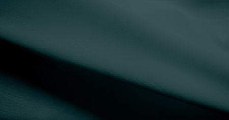 Green Fabric Texture Silk Background,Luxury Cloth Pattern Fashion,Abstract Wave Soft Material,Dark Velvet Emerald Color Backdrop.の写真素材