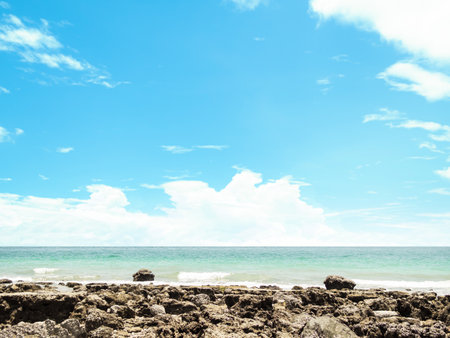 Stone Podium on Blue Sea and Blue Sky Background, Ocean at Coast Nature Summer Tropical, Calm Water Shore Island.の写真素材