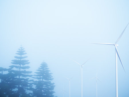 Wind turbines in a foggy forest, closeup of photo.の写真素材