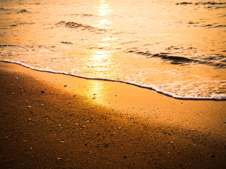 Sunset on Beach Sea Background, Sunrise on Sand Ocean Summer Tropical Wave Water Island at Coast, Beauty Nature Seascape, Dramatic Orange Dawn on Shore.の写真素材