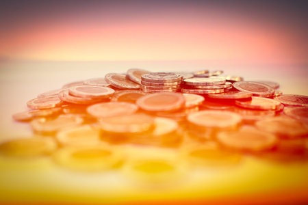 Coin Stack Pile Money Cash Symbols with Overlay Red Background, Concept for Problem Financial Debt Tex Budget Pay Bill Poor Bankruptcy Inflation Finance Credit Purse Loss.の写真素材