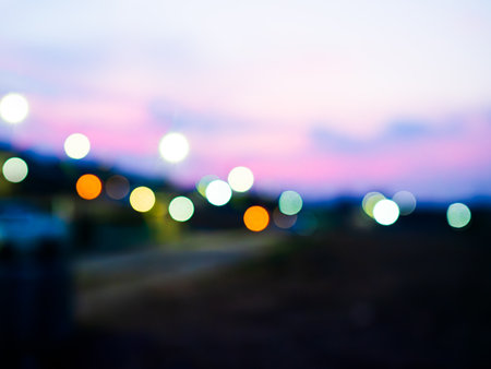 Light Night Bokeh City Blur Focus  Blue Abstract Sky Dark Street Glister Blurry Background Mockup Scene Urban Landscape Neon Cityscape Flare Traffic Evening Color View Travel Christmas Happy New Year.の写真素材