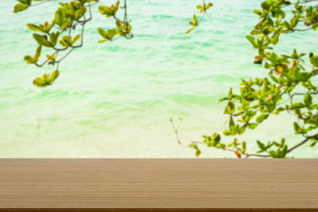 Sea Summer Table Background Display Wood Mockup Product Beauty Cosmetic on Blue Water Ocean with Green Leaf Tropical Nature Spring Sand Beach Coast Deck Scene Landscape Vacation Relax Holiday.の写真素材