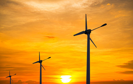 Wind Mill Turbine Power Energy Generator Farm Electric on Sunset Renewable Sustainable Environment...