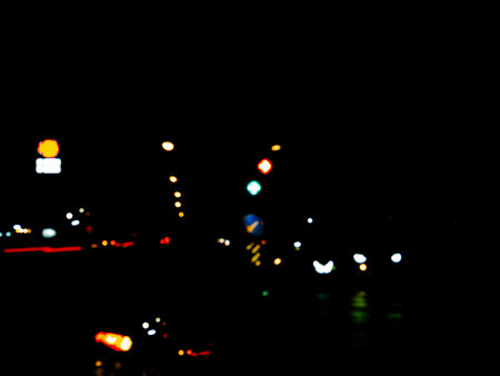 Bokeh Light Night City Blue Yellow Background Abstract blur Focus Sky Dark Blurry Street Glitter Landscape Cityscape Urban Flare Neon Evening Traffic Effect Car Orange Overlay Warm Nightclub Image.の写真素材
