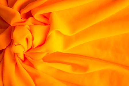 Orange Cloth Background, Fabric Texture Gold Color Pattern Silk Gradien Luxury Backdrop, Light Yellow Textile Banner Material Satin Summer Tropical Wave Display Fashion Abstract Design Poster Templateの写真素材