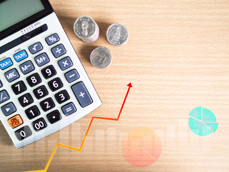 Stack Coin Money Pile Cash Calculator with graph Business Stock Market Finance Investment Bank Invest Inflation Fund Economy Marketing Trade Forex Digital Success Technology Growth Profit Increase.の写真素材