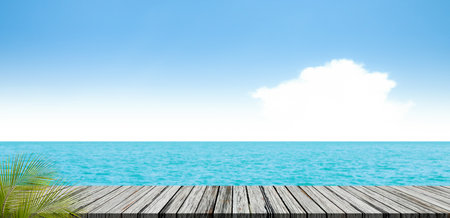 Travel concept,Sea Table Background Summer Tropical Blue Ocean with Sky Horizon Island Deck Mockup Stage Product Beauty Cosmetic Sunscreen for Tourism Vacation Relax Holiday, Nature Beautiful Scene.の写真素材