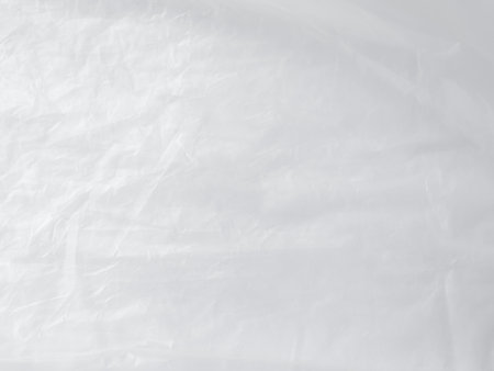 Plastic Paper Foil Silver Crumpled Wrap Film Cellophane White Background Package Pattern Sheese Bag Pvc Frame Stretch Tape Round Clean, Moden Packaging Polythene Surface Mockup Eco Environment.の写真素材