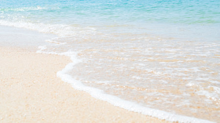 Travel Nature Concept, Sea Sand Background Blue Water at Coast Season Summer Tropical Ocean Beautiful Wave Seascape Vacation Smooth Wallpaper Island Outdoor Tropical Coast Sandy Nature Landscape.の写真素材