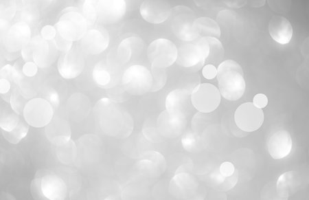 Bokeh Background Light Glow White Blur Party Celebrate Texture Abstract Effect festive Blurry Holiday Effect Glitter Silver Grey Dreamy Soft Pattern Luxury Mockup Season Winter Summer Backdrop Magic.の写真素材