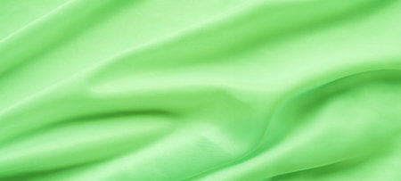 Green Fabric Texture Background silk Cloth Abstract Emerald Pattern Abstract Fashion Material Dark Light Canvas Textile Curve Card Mockup.の写真素材