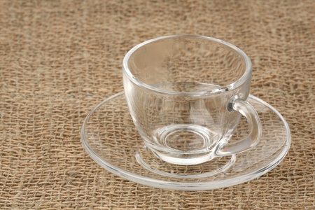 Coffee pair of transparent glass against a sacking の写真素材