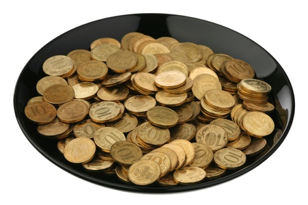 Russian coins on a plate are isolated on a white background の写真素材