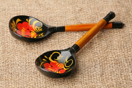 Two wooden spoons on a sacking の写真素材