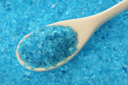 Sea salt for baths in a wooden spoon の写真素材