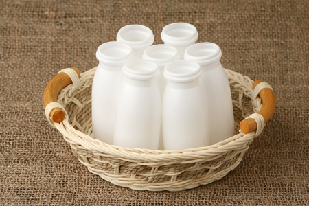 Plastic bottle packs in a basket の写真素材