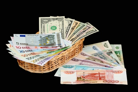 Dollars, euro and roubles on a black background の写真素材