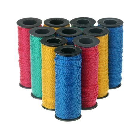 Bobbins of thread isolated on white background 