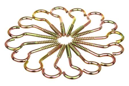 Screws with loops lie on a circle isolated over white backgroundの写真素材