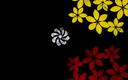 top view of awesome rangoli on black background with copy space in a left. deepawali conceptの写真素材