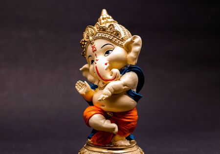 front view of beautiful ganesha statue on blurry background,  traditional conceptの写真素材