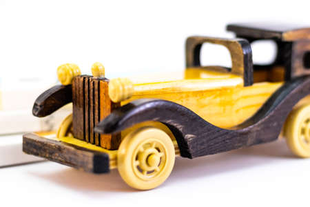 Close up shot of the bonnet or hood of a wooden vintage toy car in classic conceptの写真素材