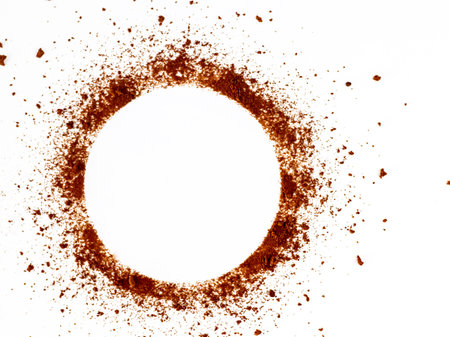 Closeup shot of coffee powder circle isolated on white background..の写真素材