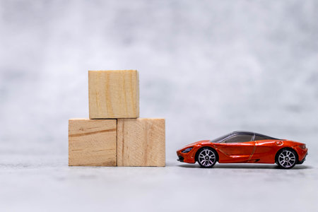 Close up shot of wooden blocks with car on defocused background-Edit.の写真素材