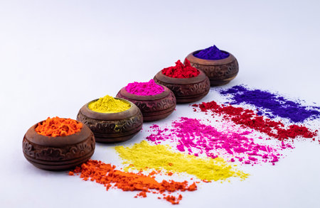 Assorted dry colors in wooden pots over white background - Holi festival.CR2の写真素材