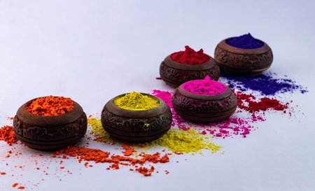 Beautiful set up of dry colors in small wooden pots - Holi festival.の写真素材