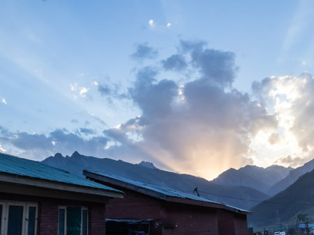 Low angle shot of a small town with houses in the mountainsの写真素材
