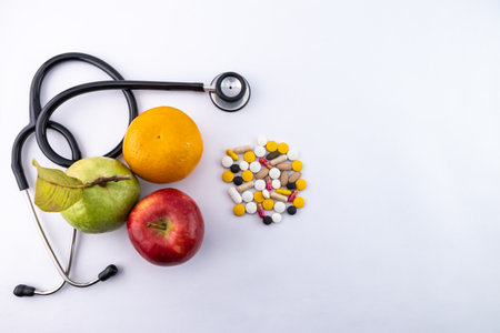 Health care concept with medicine and fruits with stethoscope.の写真素材