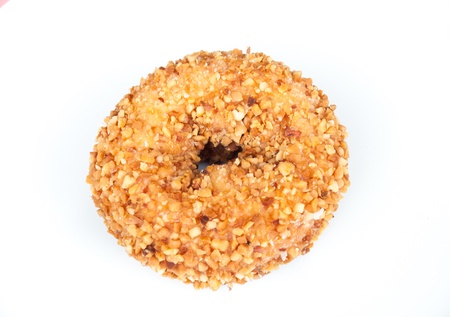 A almond donut isolated on white background の写真素材