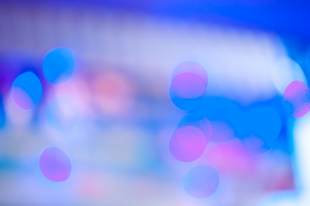 The abstract of circle blue and pink light bokeh backgroundの写真素材