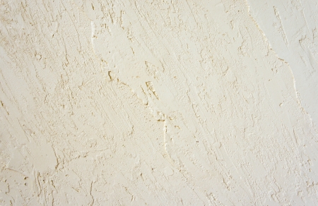 The abstract background of cement paste wall texture の写真素材