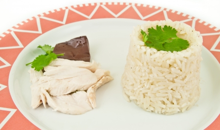 The dish of steam chicken with rice (Hainan Chicken)の写真素材