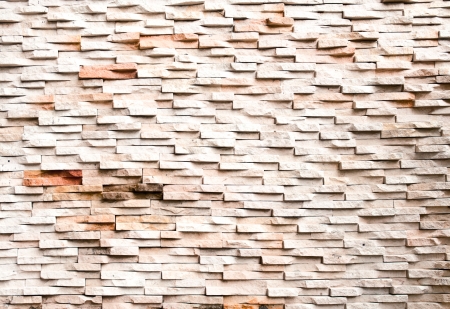 The pattern of sand stone tile wall background.の写真素材