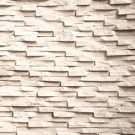 The pattern of sand stone tile wall background.の写真素材