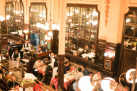 blur background of people have dinner in restaurantの写真素材