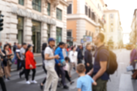 blur background of crowded people walk across the roadの写真素材