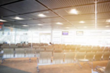 blur background of passengers waiting at the airportの写真素材