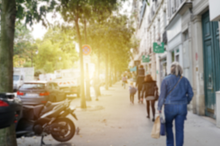 blur background of people walk on street in Paris, Franceの写真素材