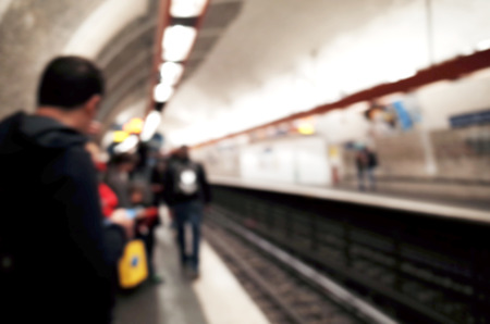 blur background of passengers waiting at subwayの写真素材
