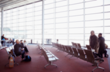 blur background of passengers waiting at the airportの写真素材