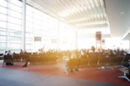 blur background of passengers waiting at the airport