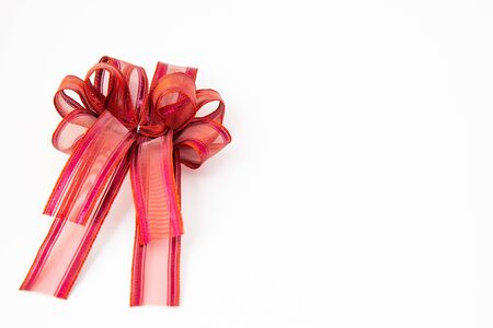 close up red ribbon or bow decorate on present box conceptの写真素材